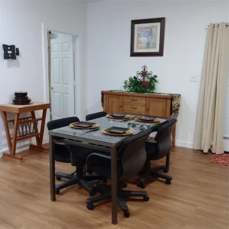 a view of a workspace with furniture
