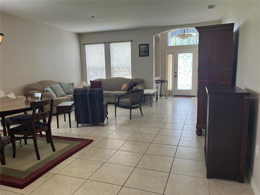 5966 Willows Bridge Loop Ellenton, FL 34222 - Photo 19 of 57 a view of a livingroom with furniture and window