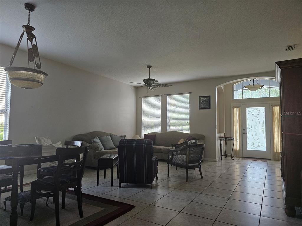 5966 Willows Bridge Loop Ellenton, FL 34222 - Photo 21 of 57 a living room with furniture and a window