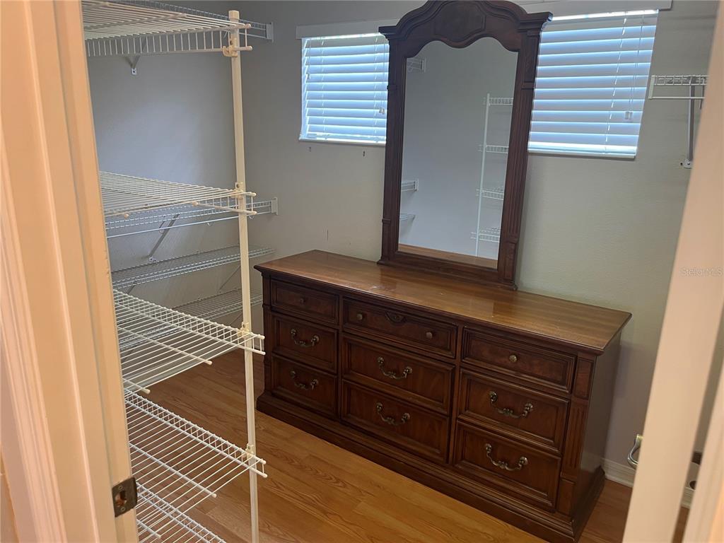 5966 Willows Bridge Loop Ellenton, FL 34222 - Photo 39 of 57 a bathroom with a sink and a mirror