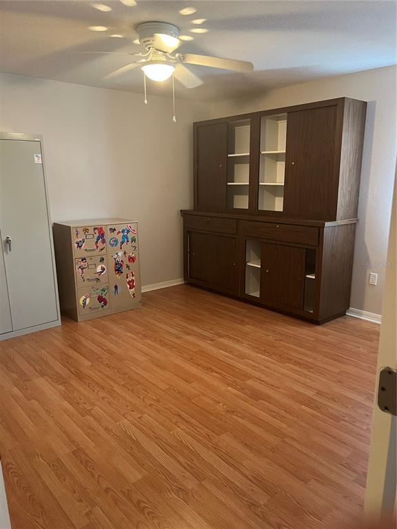 5966 Willows Bridge Loop Ellenton, FL 34222 - Photo 44 of 57 a bedroom with a bed and a mirror on dresser