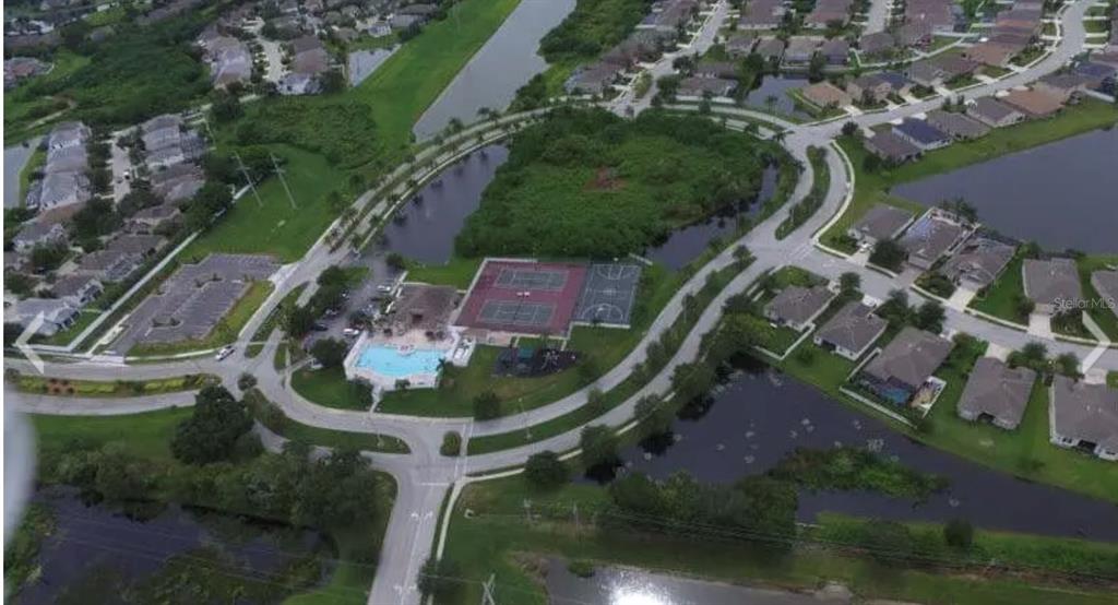 5966 Willows Bridge Loop Ellenton, FL 34222 - Photo 54 of 57 an aerial view of a house with outdoor space and a lake view in back