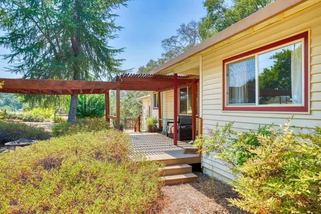 a balcony view with a outdoor seating space