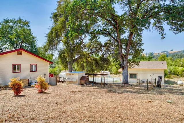 a bedroom with a bed and a flat tv screen