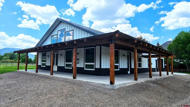 a view of a house with a porch