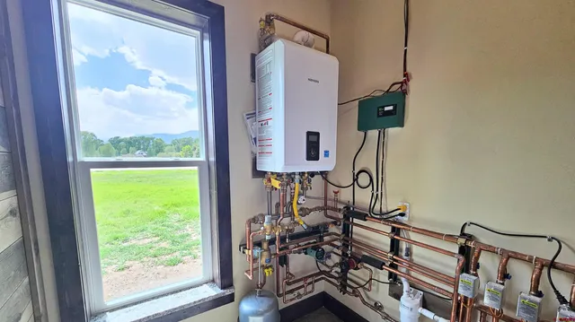 a close view of a sink and a stove in a kitchen