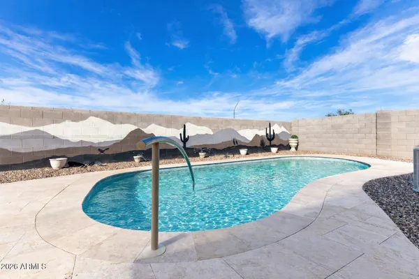 a view of a garden and basketball court