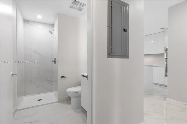 an entryway with white walls