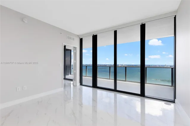 a bathroom with a sink and a window
