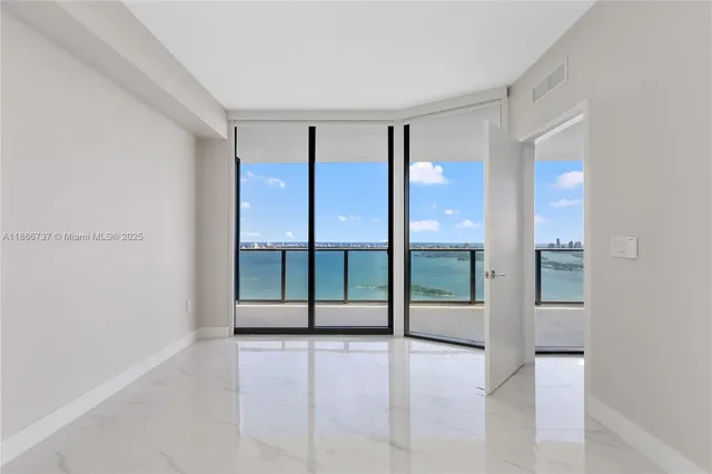 a bathroom with a sink and a large mirror