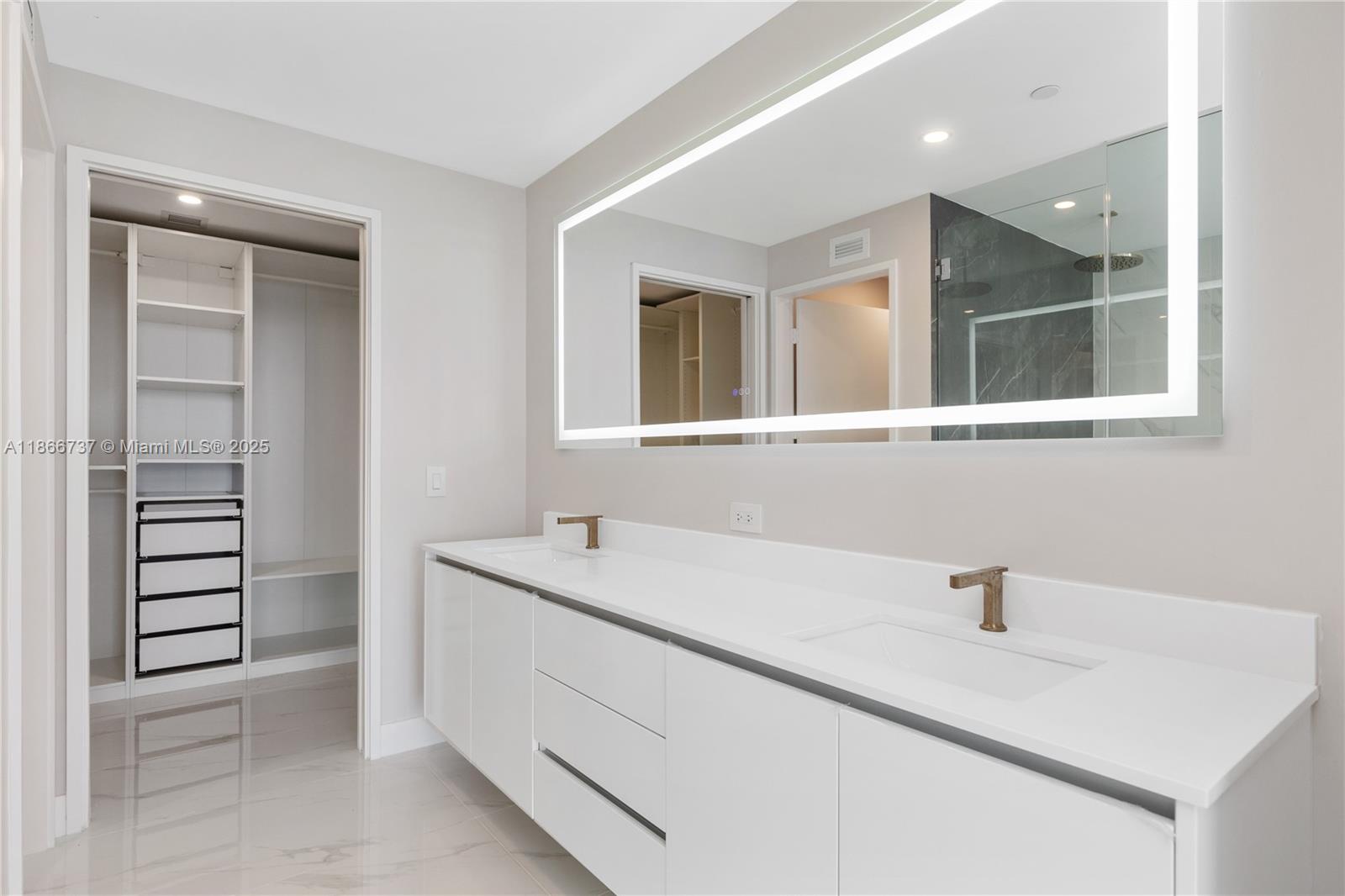700 Northeast 24th Street, Unit 4206 Miami, FL 33137 - Photo 22 of 79 a bathroom with a sink and a window