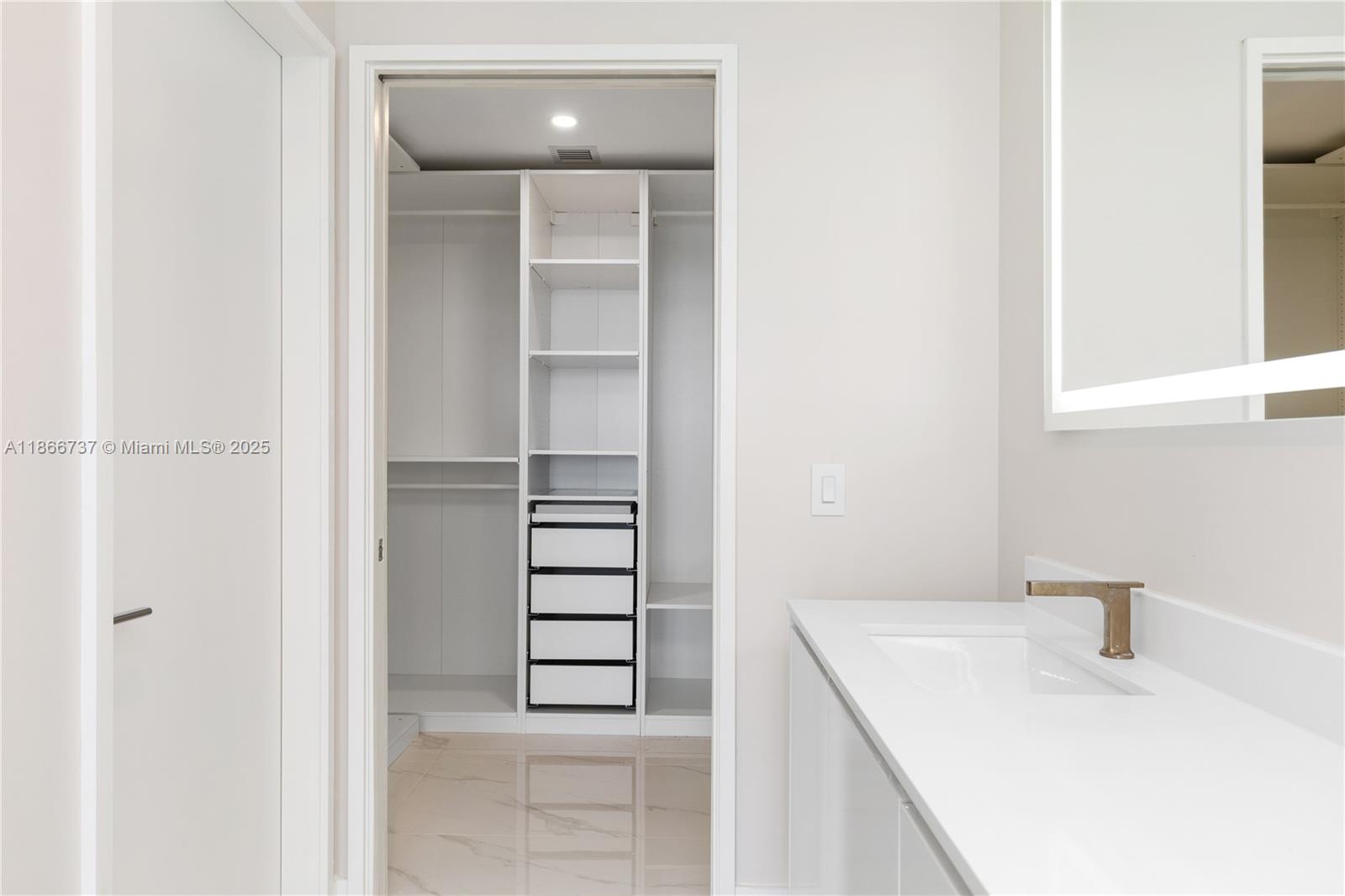 700 Northeast 24th Street, Unit 4206 Miami, FL 33137 - Photo 23 of 79 a bathroom with a sink and a bathtub