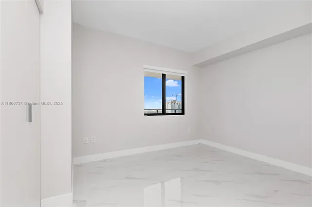 a view of swimming pool with seating area