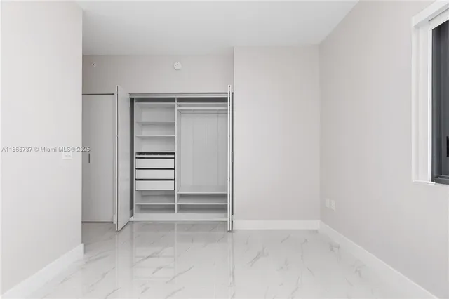 a swimming pool with outdoor seating and yard