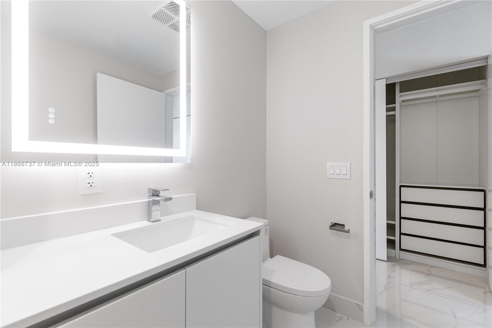 700 Northeast 24th Street, Unit 4206 Miami, FL 33137 - Photo 30 of 79 a bathroom with a sink toilet and shower