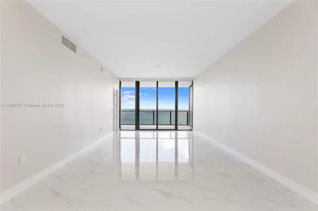 a kitchen with a sink and a stove