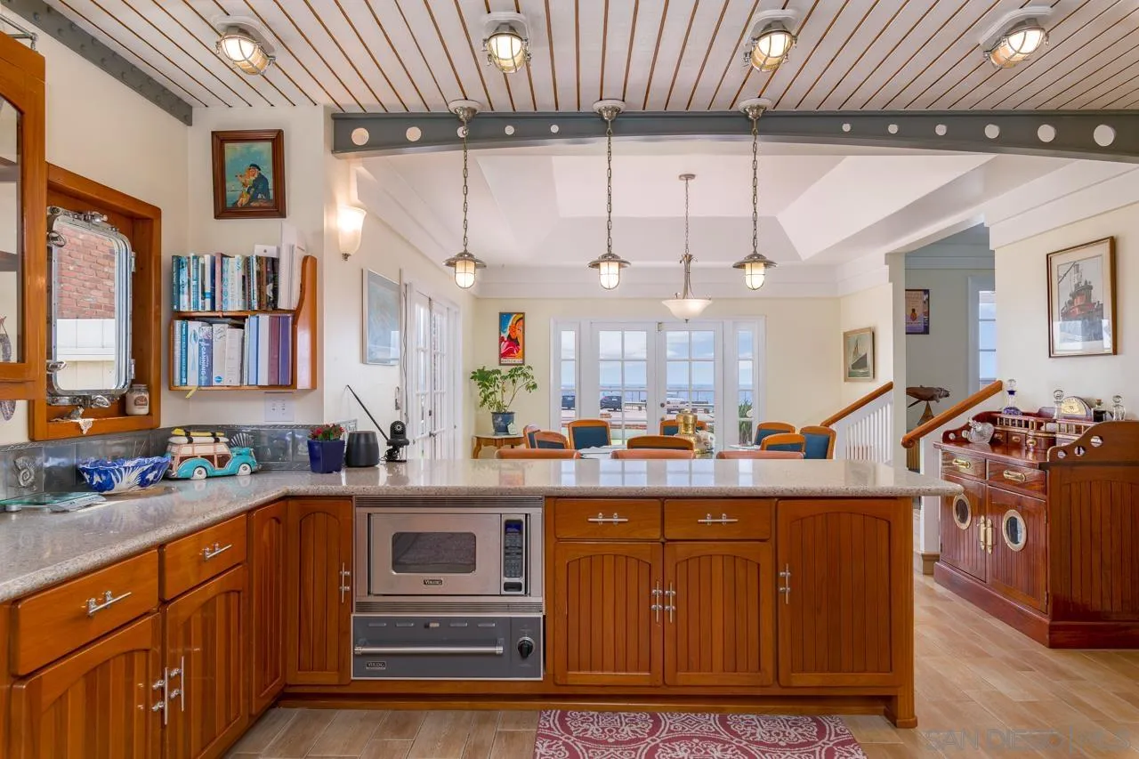 1295 Sunset Cliffs Boulevard San Diego, CA 92107 - Photo 26 of 32 a kitchen with lots of counter top space and a sink