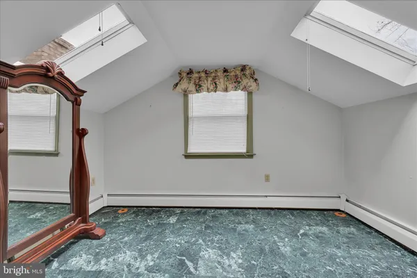 a view of a room with rack and wooden floor