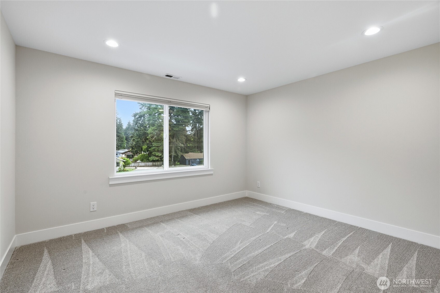 719 Edmonds Way Edmonds, WA 98020 - Photo 28 of 40 a view of an empty room with a window