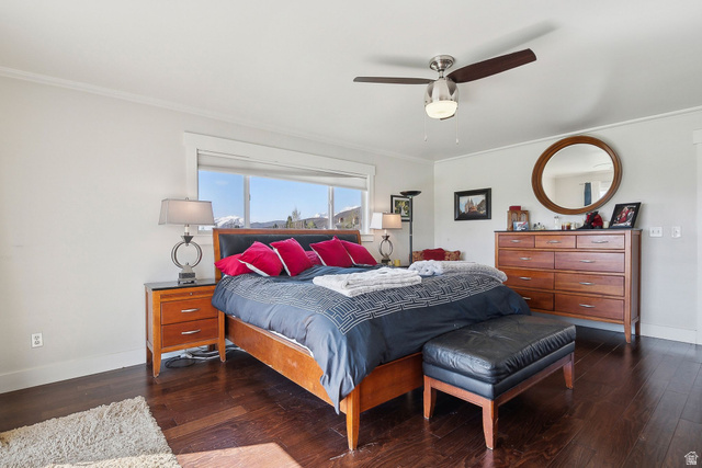 550 Pine Canyon Road Midway, UT 84049 - Photo 16 of 44 Bright room featuring hard surface flooring, a wide window with exterior scenery, a ceiling fan with integrated lighting, and white baseboards