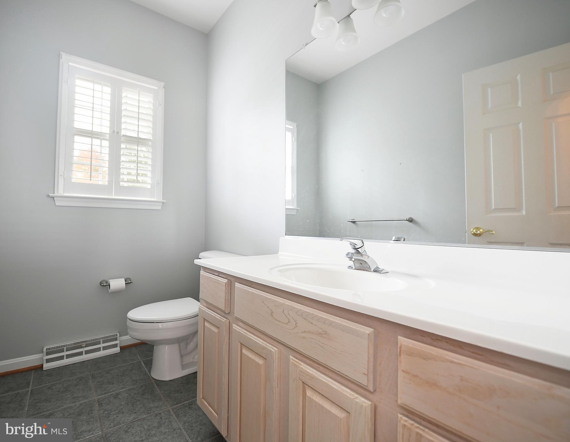 1401 Woodridge Manor Road Fallston, MD 21047 - Photo 15 of 29 Entry level half bath off of kitchen