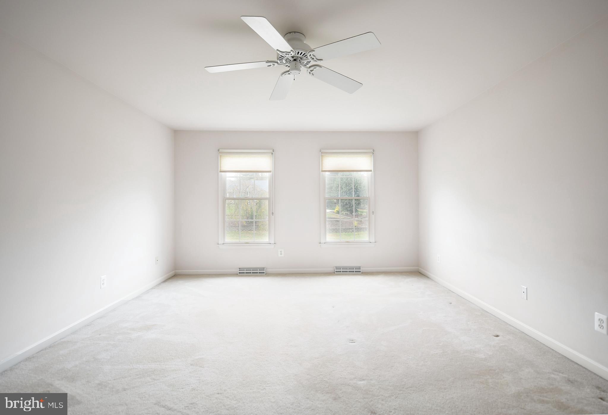 1401 Woodridge Manor Road Fallston, MD 21047 - Photo 18 of 29 Primary Bedroom with carpet and ceiling fan