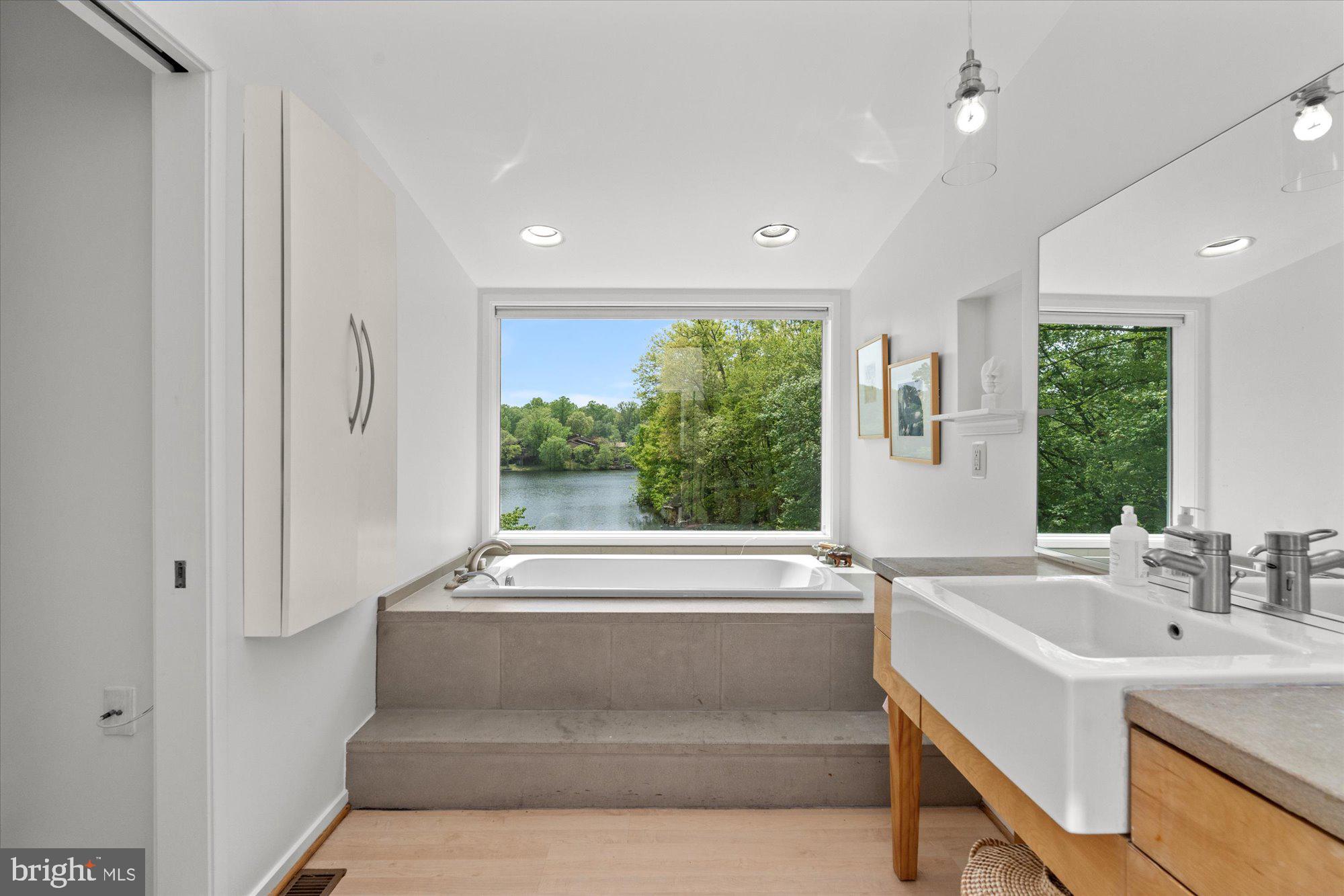2002 Cutwater Court Reston, VA 20191 - Photo 49 of 91 Soaking tub in primary bathroom w/ panoramic views