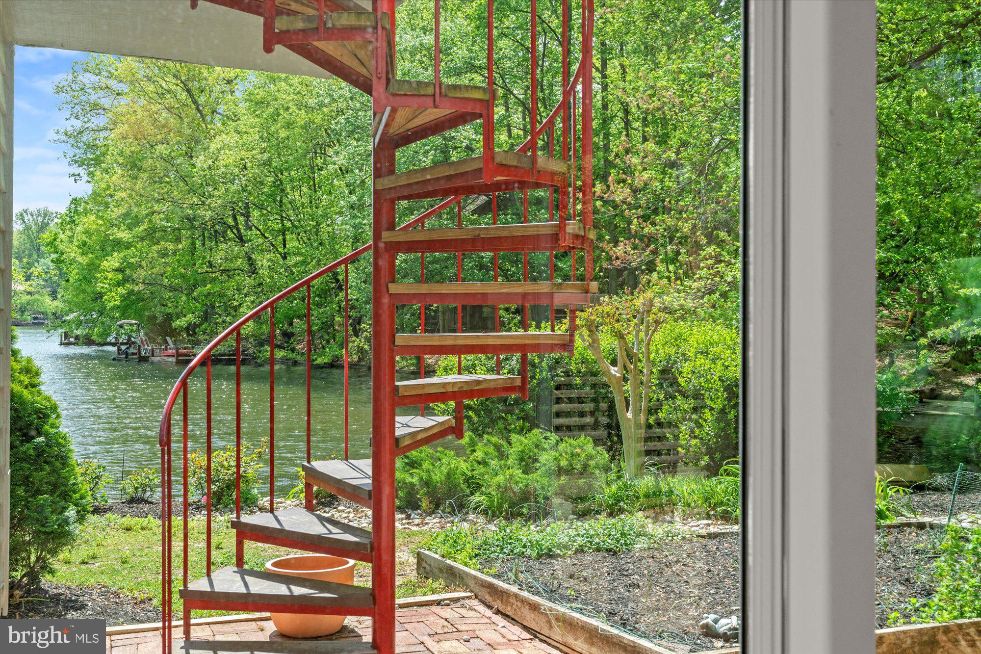 2002 Cutwater Court Reston, VA 20191 - Photo 72 of 91 Spiral staircase to main level balcony