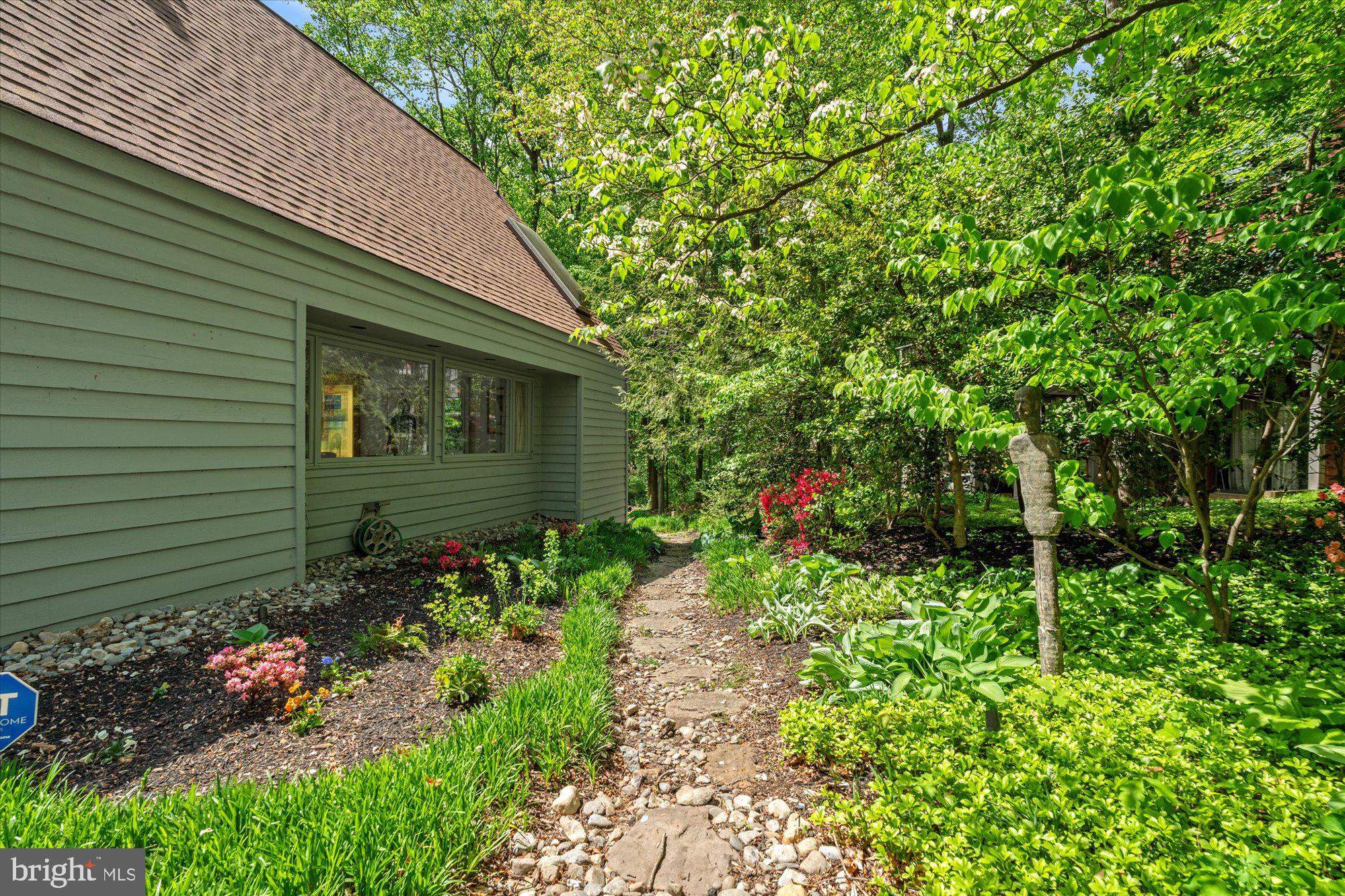 2002 Cutwater Court Reston, VA 20191 - Photo 80 of 91 Front yard path leading around the home to lake