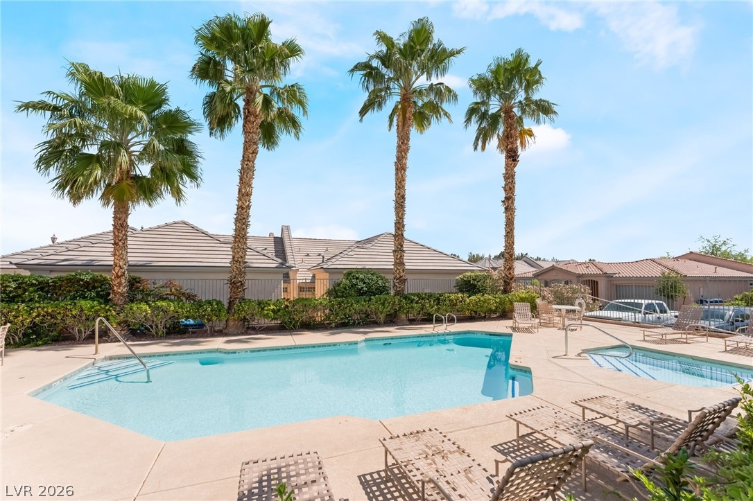 10481 Riverside Park Avenue Las Vegas, NV 89135 - Photo 36 of 51 Community pool featuring a patio