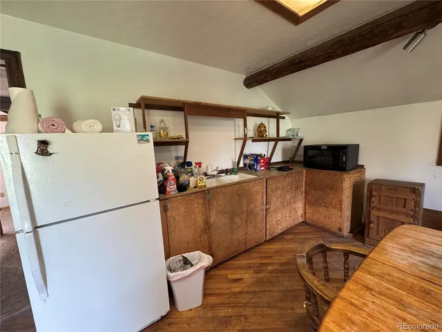 a bedroom with a bed and furniture