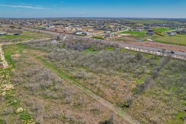 a view of a lake with a city