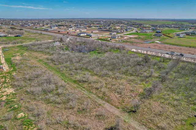 a view of a lake with a city