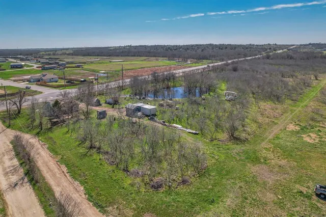 a view of a garden with a bench