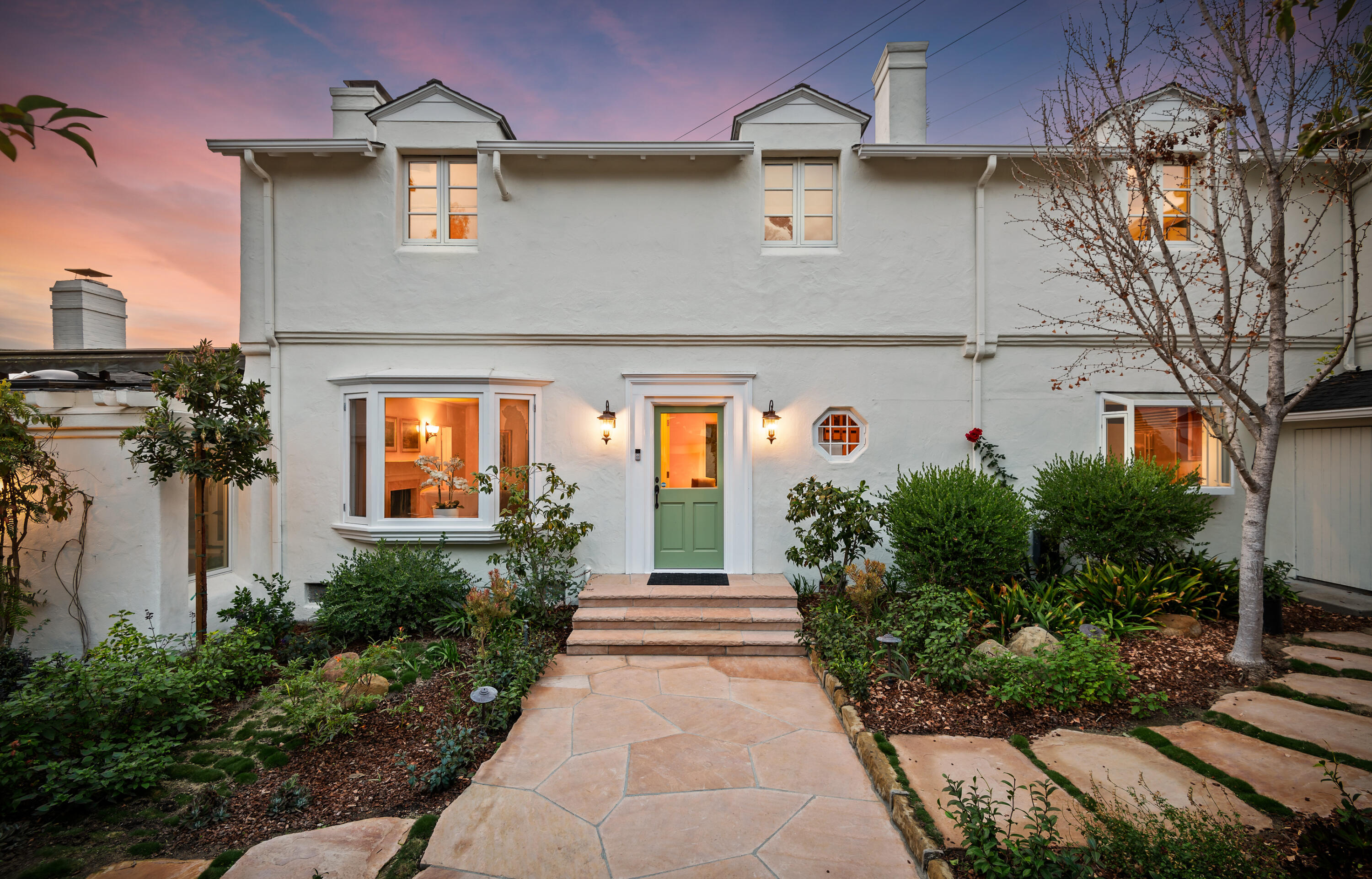 189 Hermosillo Road Montecito, CA 93108 - Photo 4 of 47 a front view of a house with garden