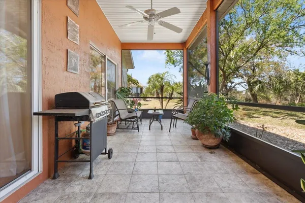 a outdoor living space with furniture and a potted plant