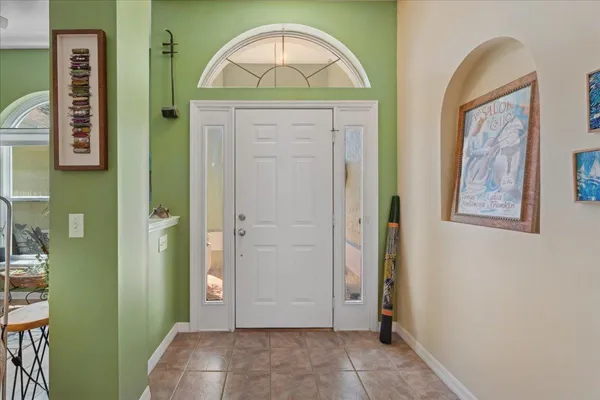 a view of front door with a hallway