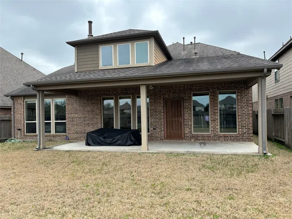 a house view with a outdoor space