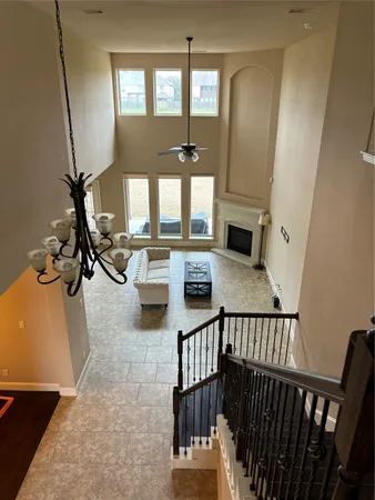 a view of a livingroom with furniture and windows
