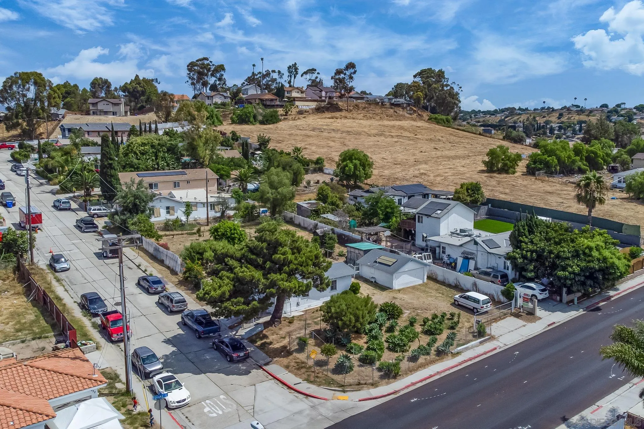7054 Lisbon Street San Diego, CA 92114 - Photo 2 of 38 an aerial view of a house with a yard