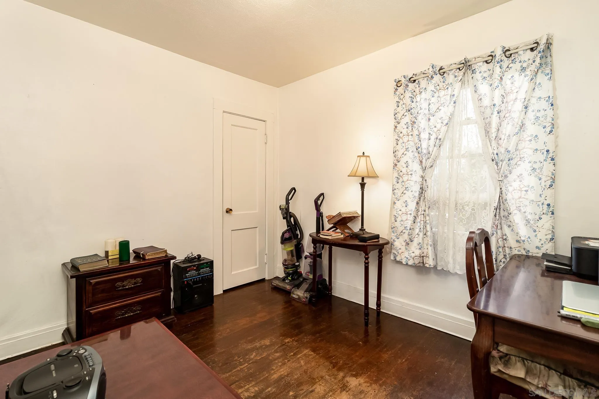 7054 Lisbon Street San Diego, CA 92114 - Photo 22 of 38 a view of a workspace with furniture