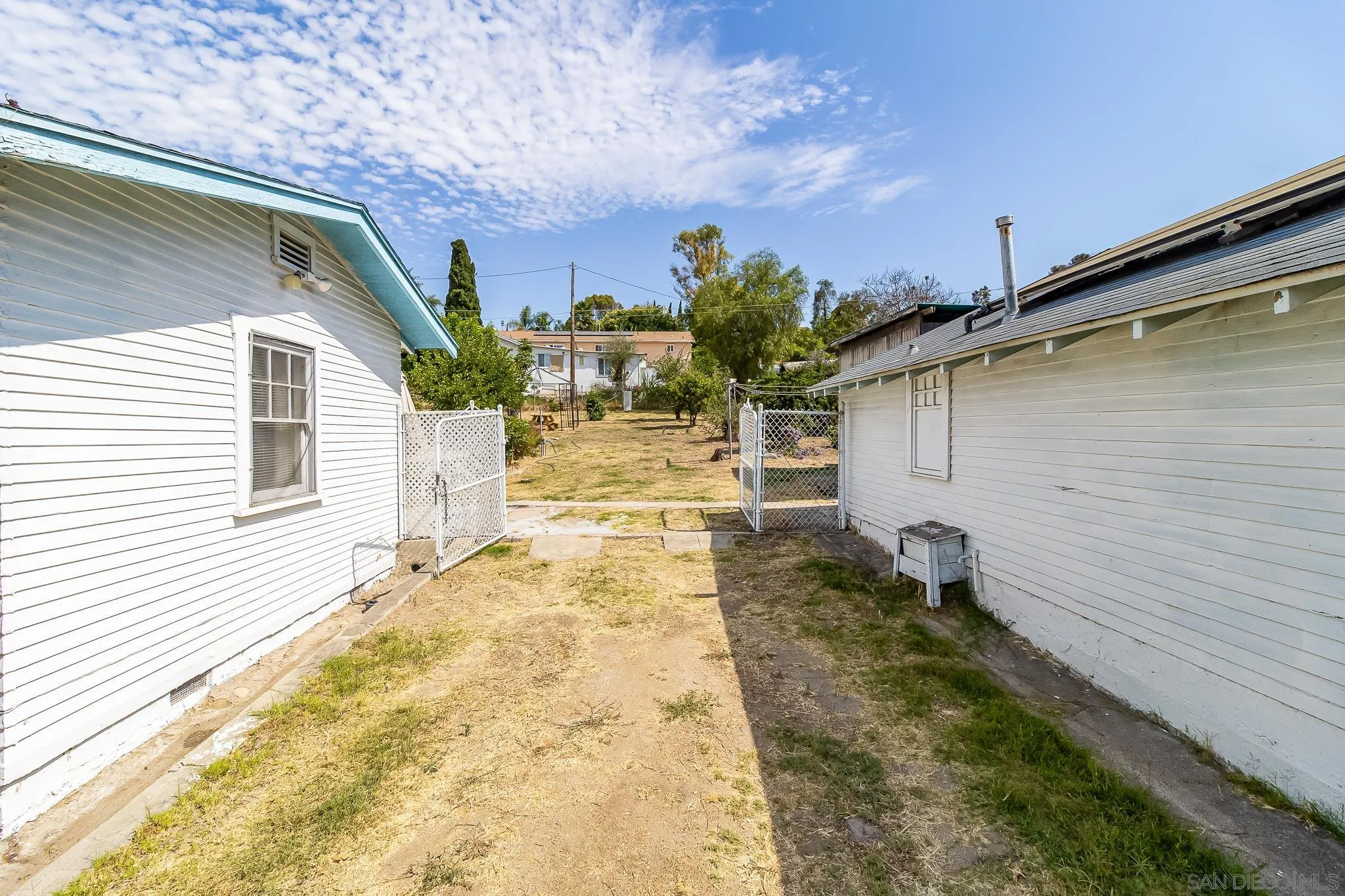 7054 Lisbon Street San Diego, CA 92114 - Photo 25 of 38 a view of a backyard