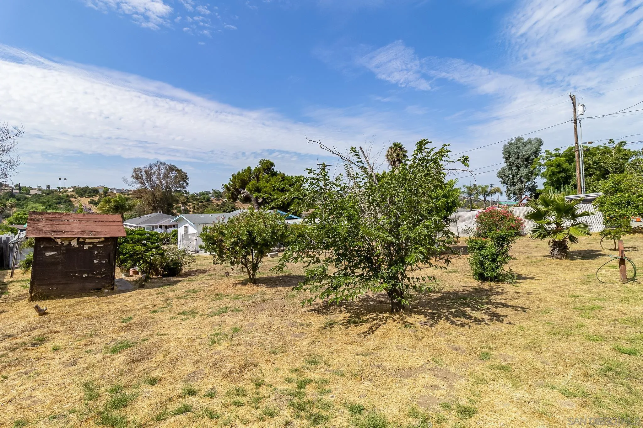 7054 Lisbon Street San Diego, CA 92114 - Photo 30 of 38 a view of a garden with an outdoor space