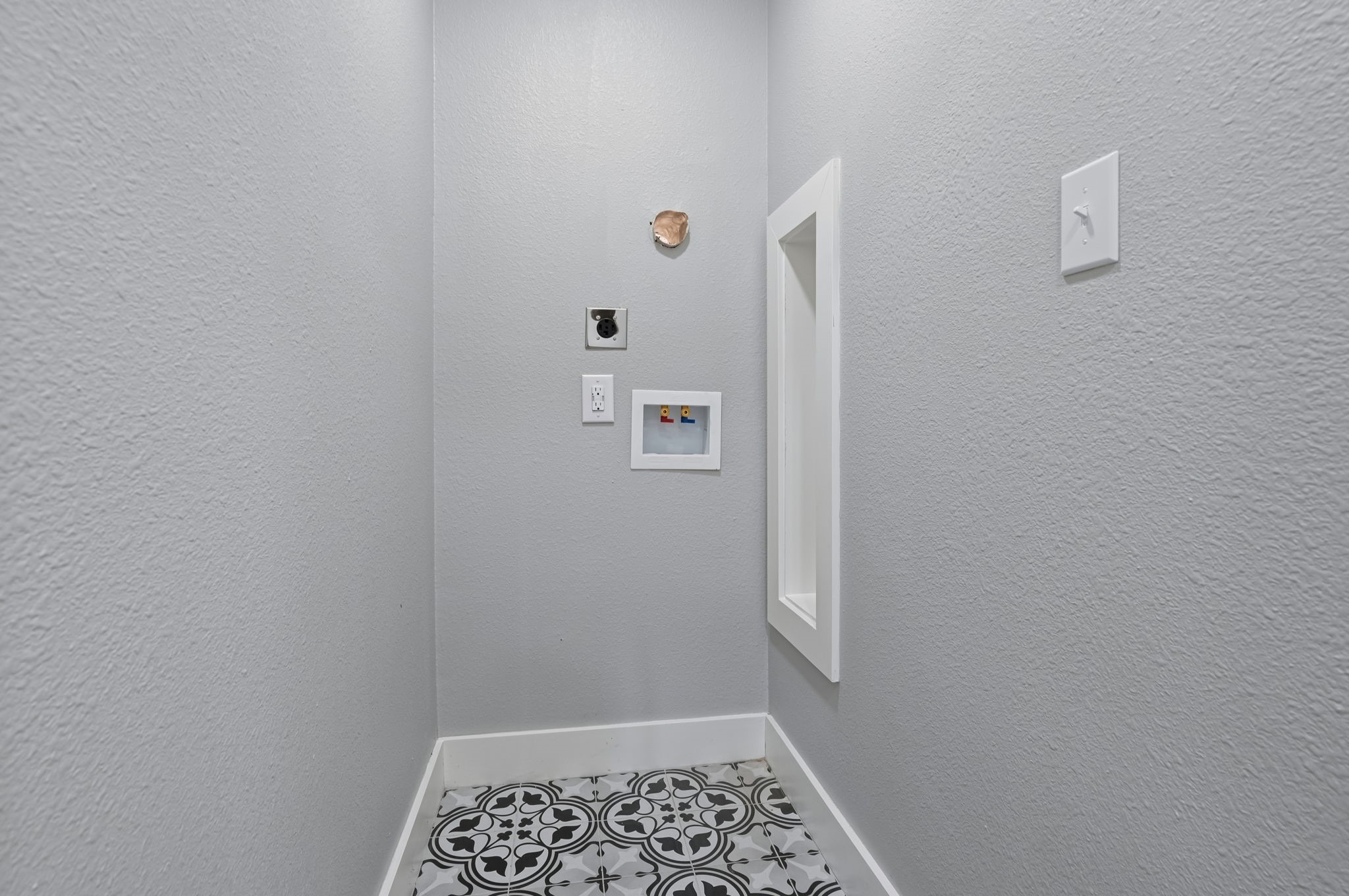 284 Hackberry Street Trinity, TX 75862 - Photo 21 of 42 The lower hallway also features the laundry room closet space.