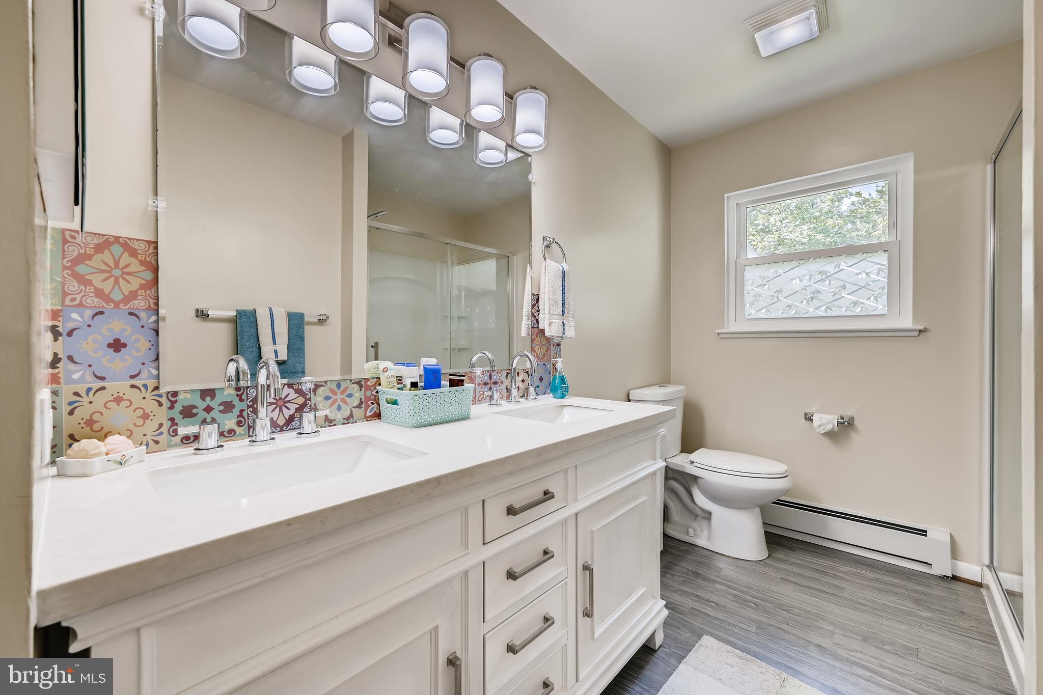 6111 Collinsway Road Baltimore, MD 21228 - Photo 20 of 36 Main level hall bath