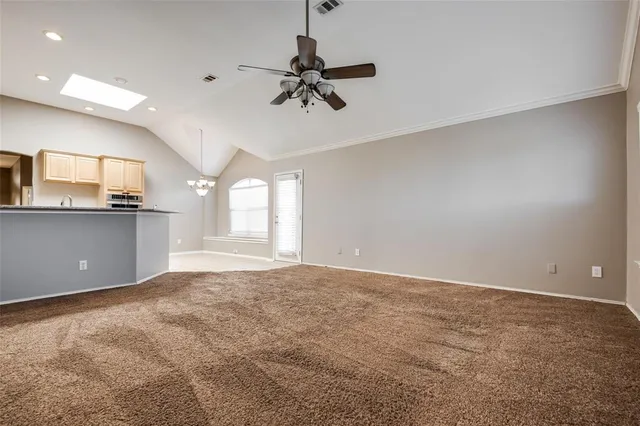 a view of a kitchen with a sink and cabinet