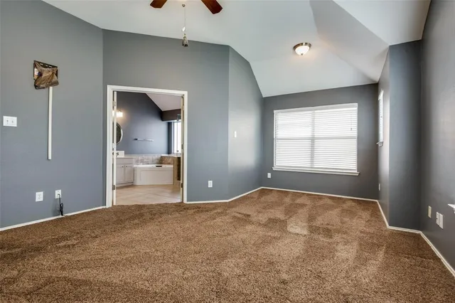 a view of a kitchen with a sink and a window