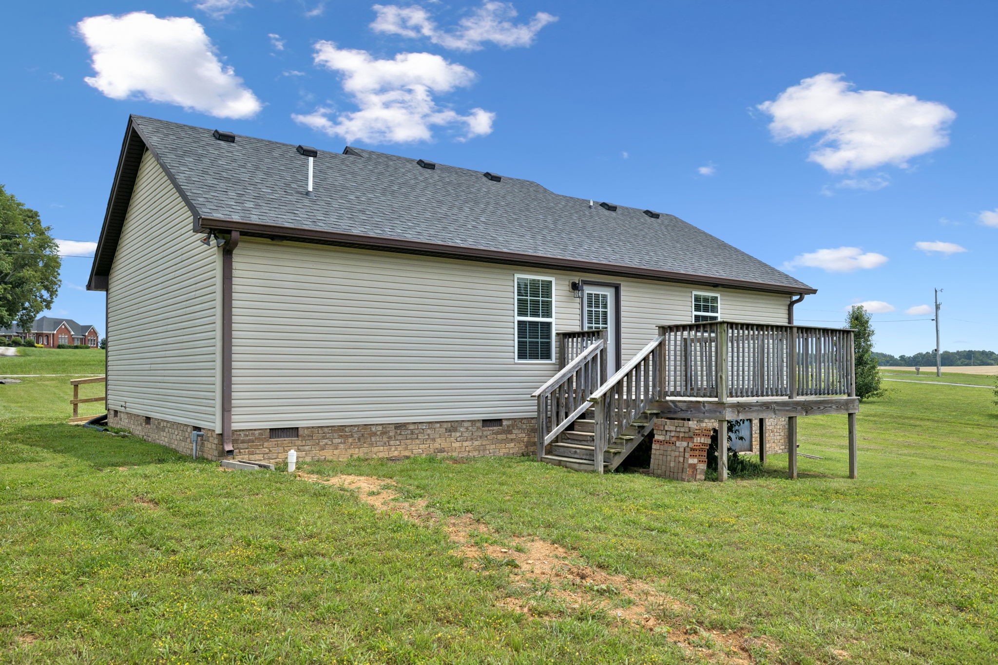 819 White Road Portland, TN 37148 - Photo 14 of 21 a view of a house with a backyard