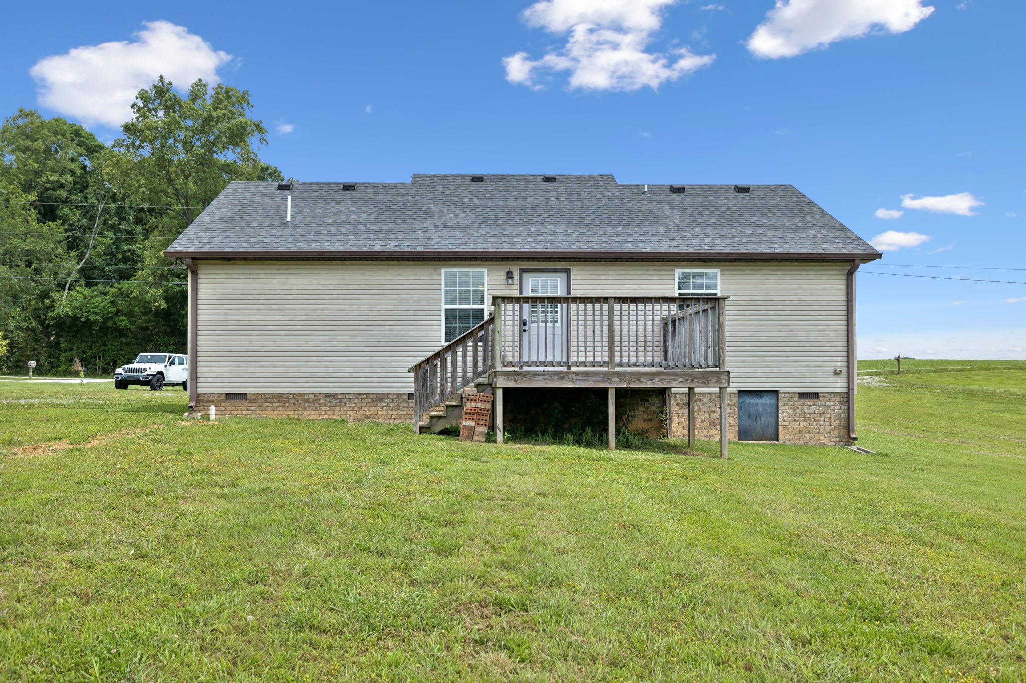 819 White Road Portland, TN 37148 - Photo 15 of 21 a view of a house with a yard porch and sitting area