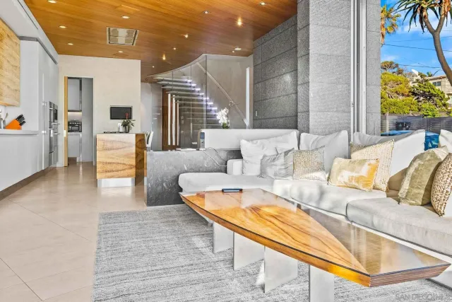 a kitchen with stainless steel appliances kitchen island granite countertop a sink and cabinets